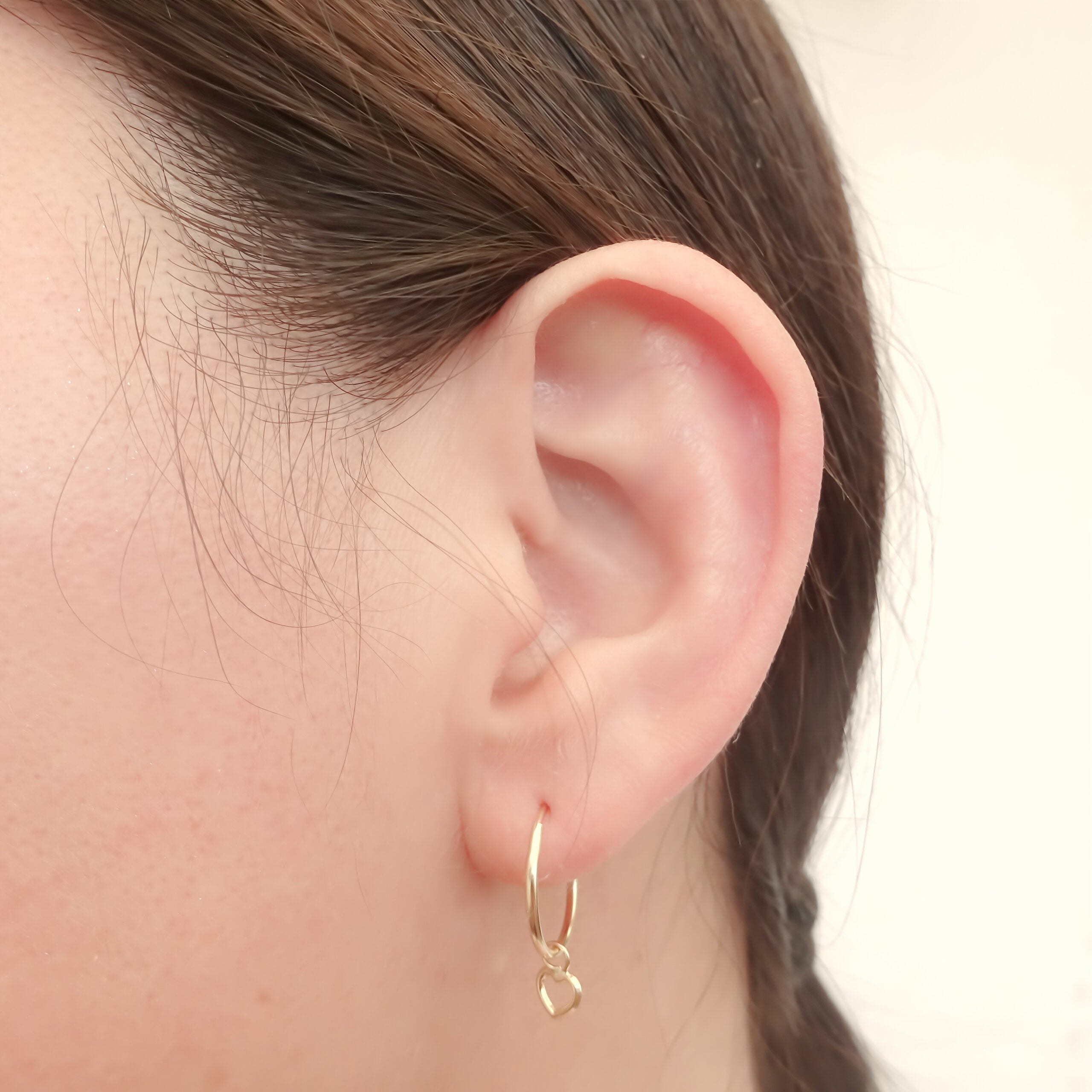 Dije con arracada corazón Oro 10k.