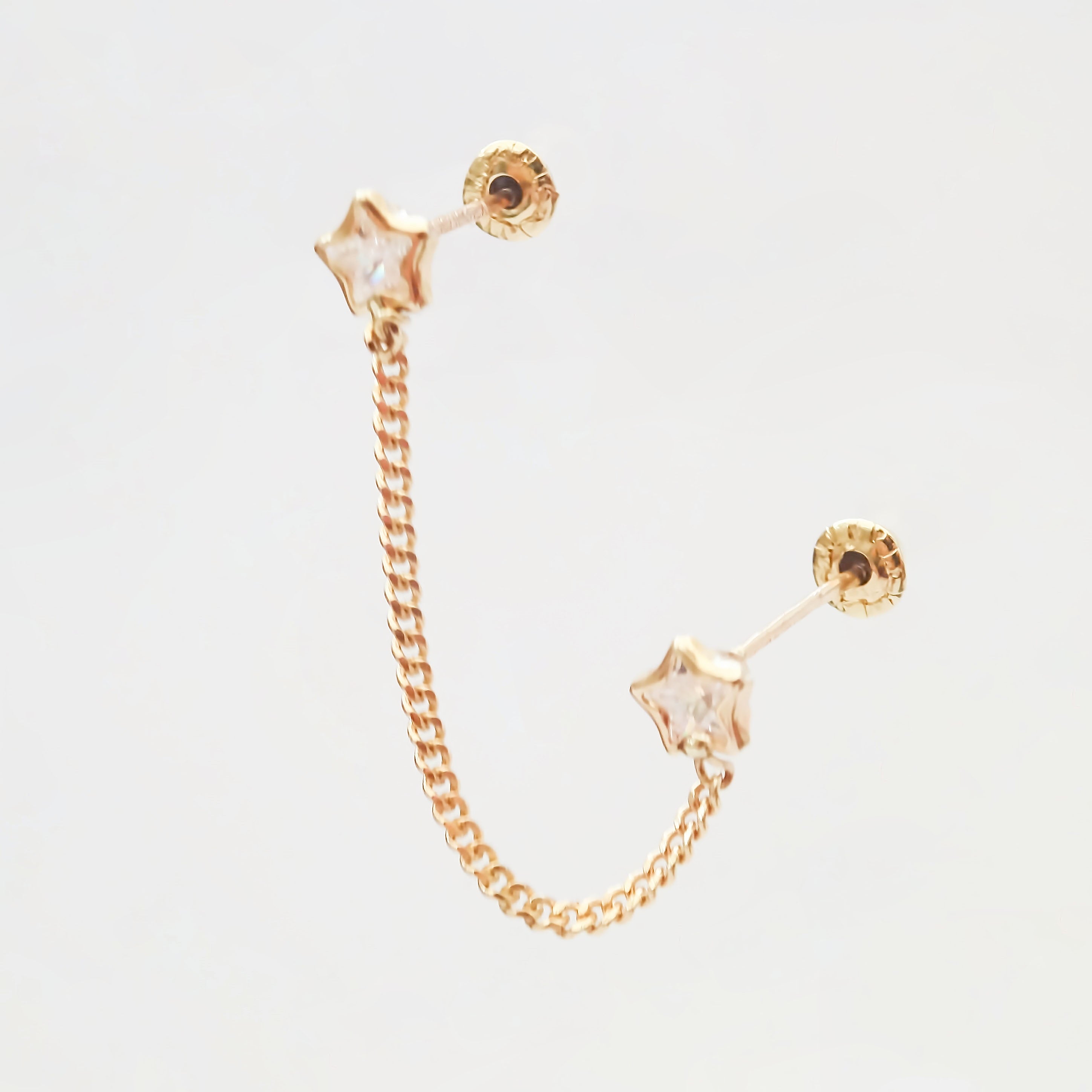 Amor Eterno - Estrella Bisel / Doble Perforación / Oro 10k