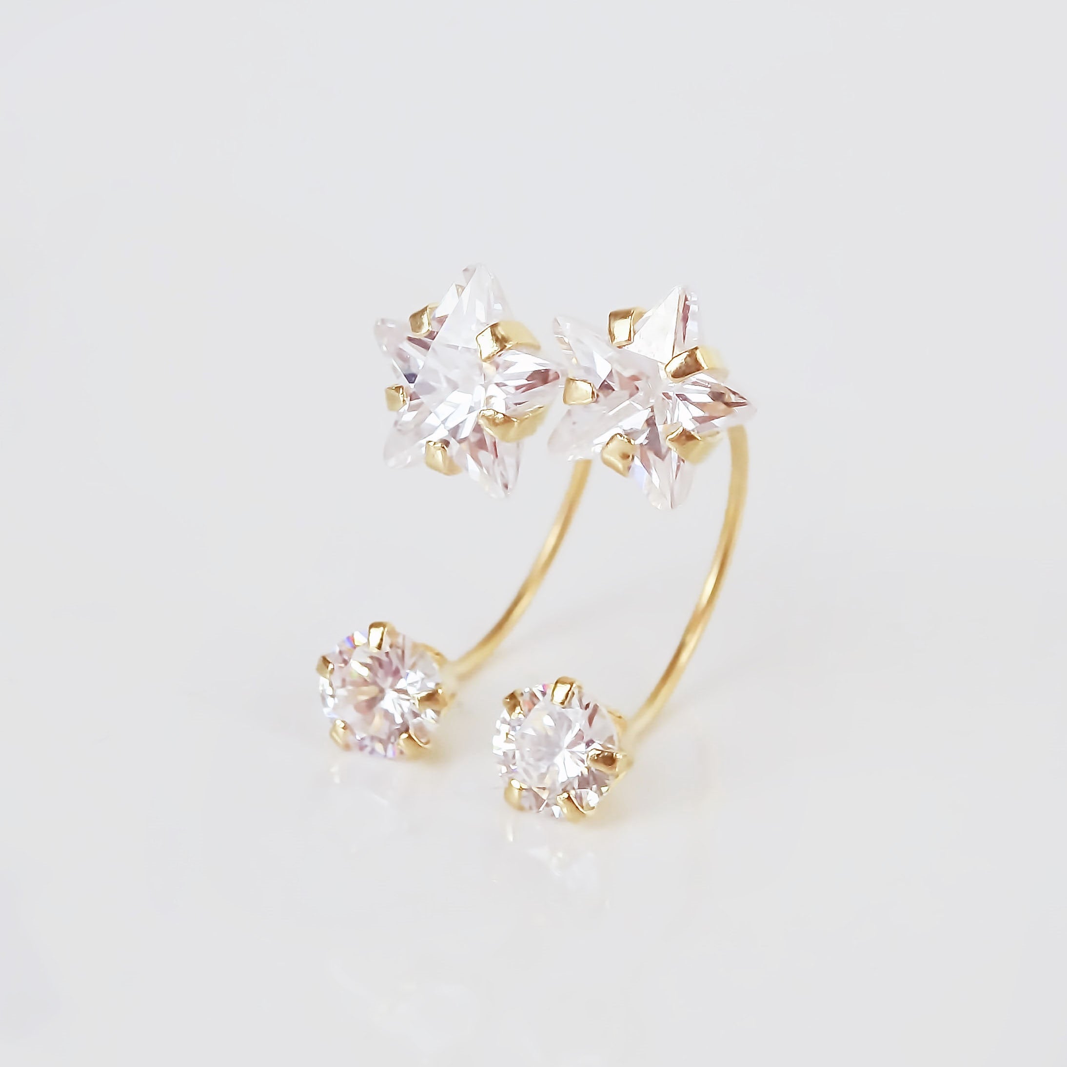 Amor Eterno - Broqueles Curvos Estrella / Aretes Oro 10k