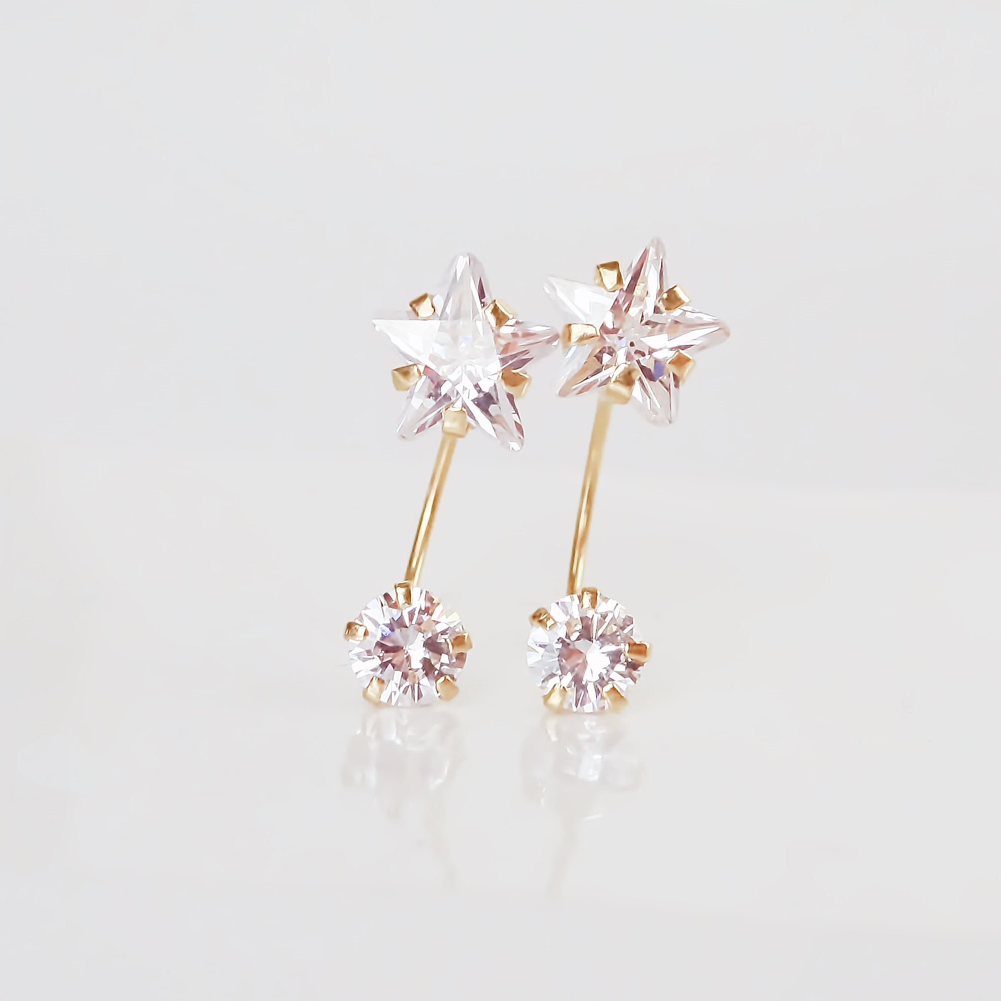Amor Eterno - Broqueles Curvos Estrella / Aretes Oro 10k