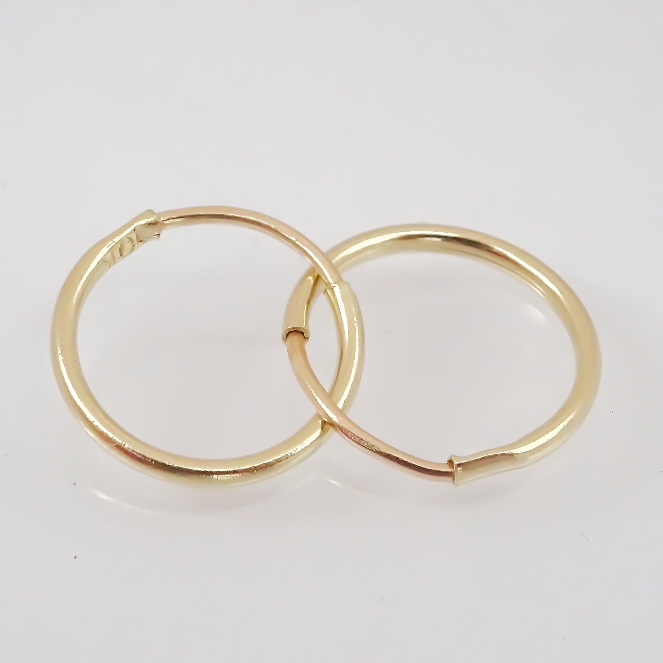 Arracadas lisas 7 mm Oro amarillo 10 k.
