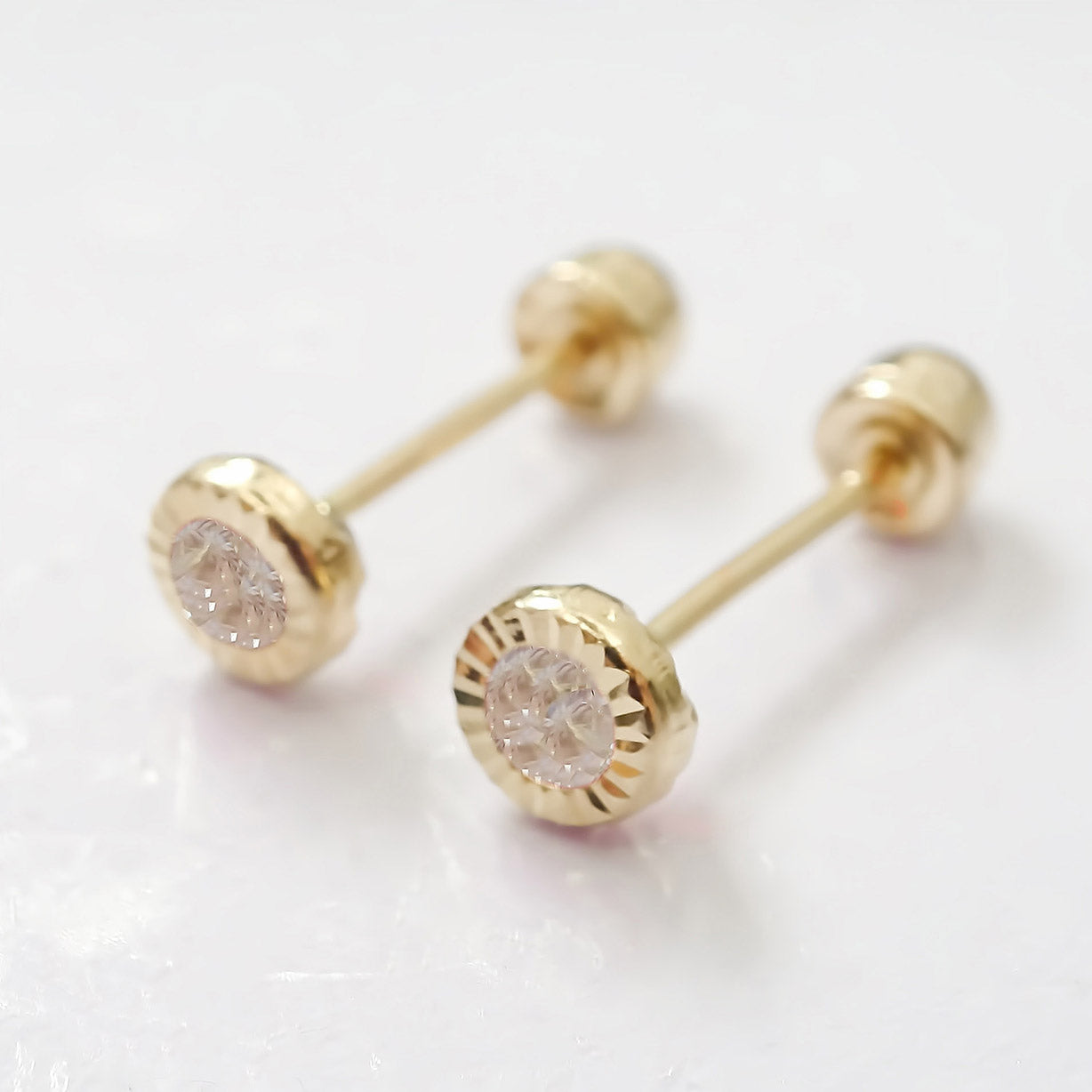 Amor Eterno - Broqueles Facetado Bebé / Aretes / Oro 10k / Transparente