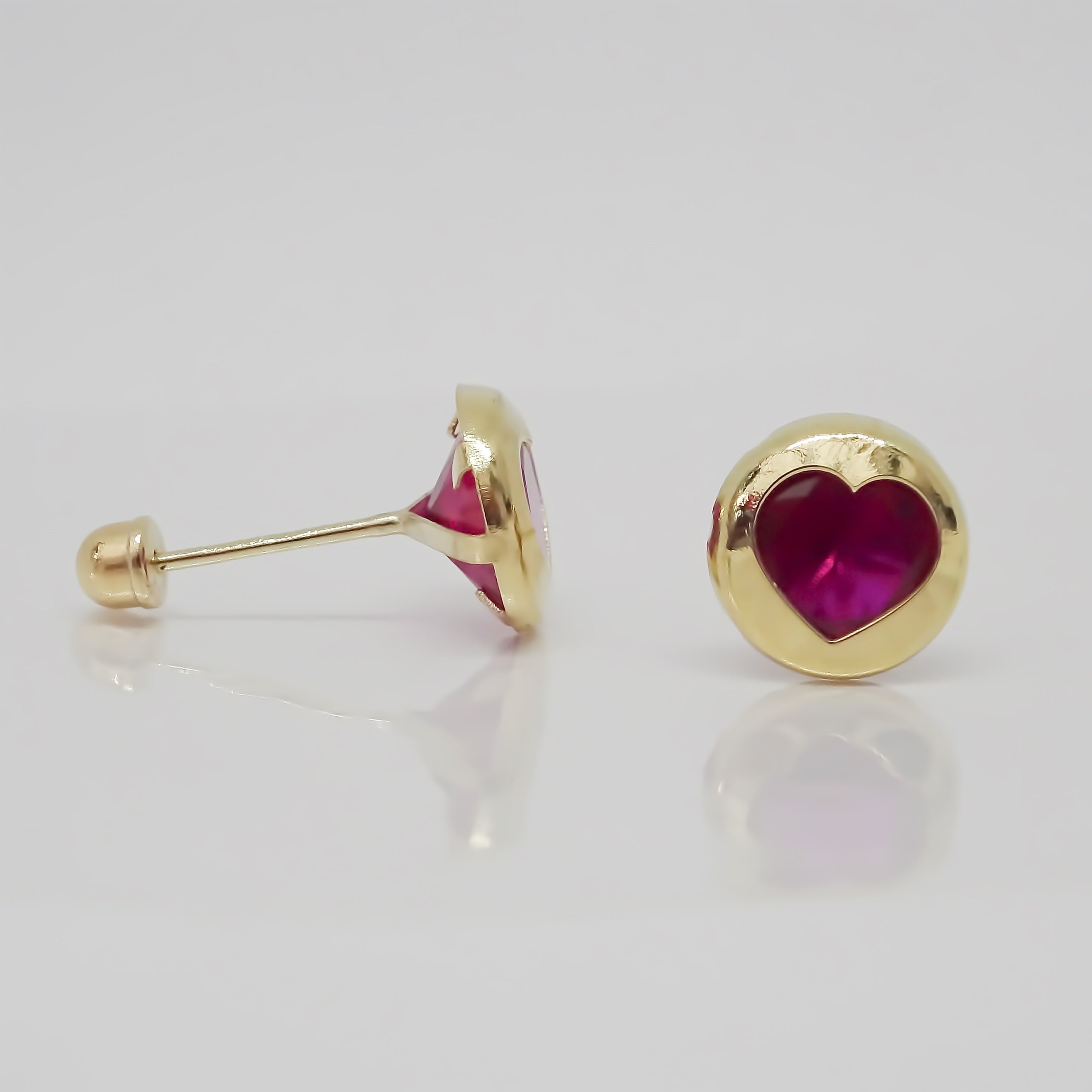 Amor Eterno - Broqueles Bisel Corazón / Aretes / Oro 10k / Fucsia