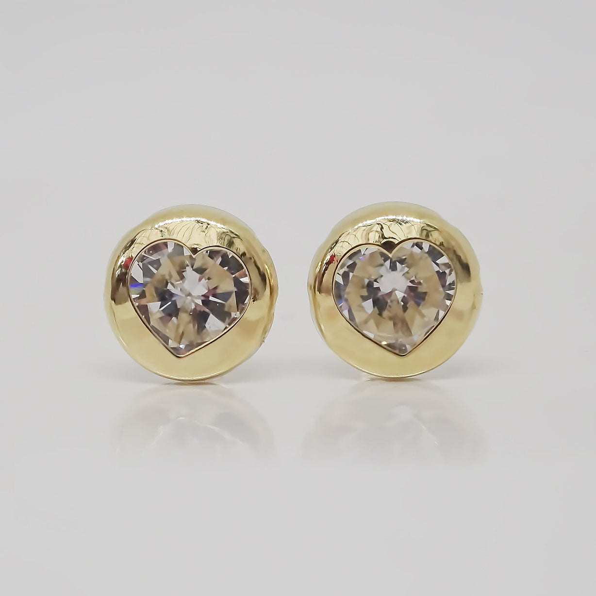 Amor Eterno - Broqueles Bisel Corazón / Aretes / Oro 10k / Transparente