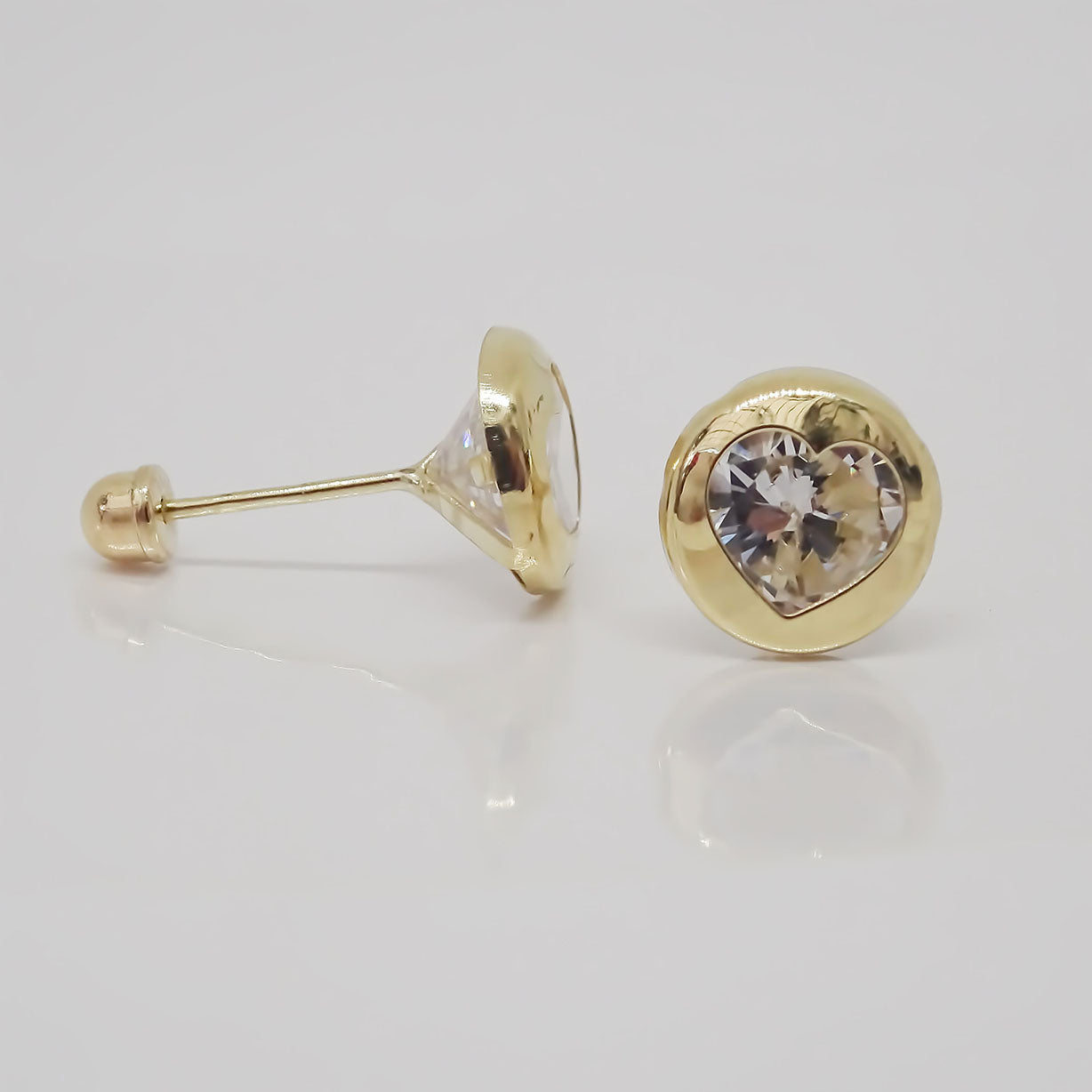 Amor Eterno - Broqueles Bisel Corazón / Aretes / Oro 10k / Transparente