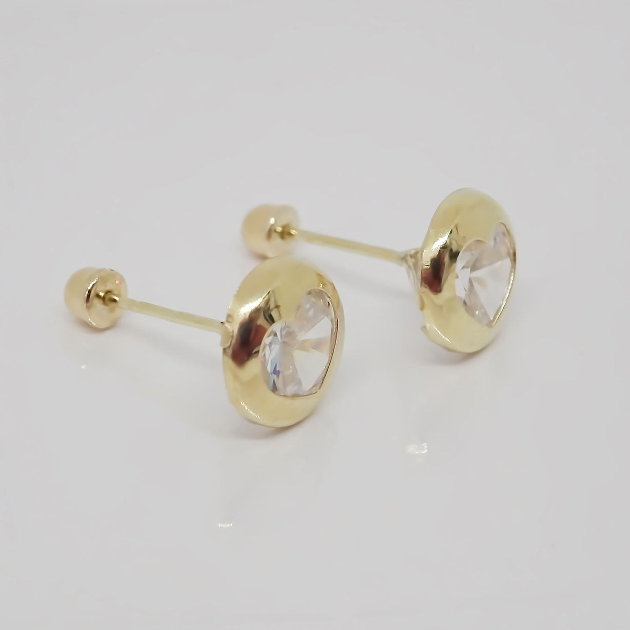 Amor Eterno - Broqueles Bisel Corazón / Aretes / Oro 10k / Transparente